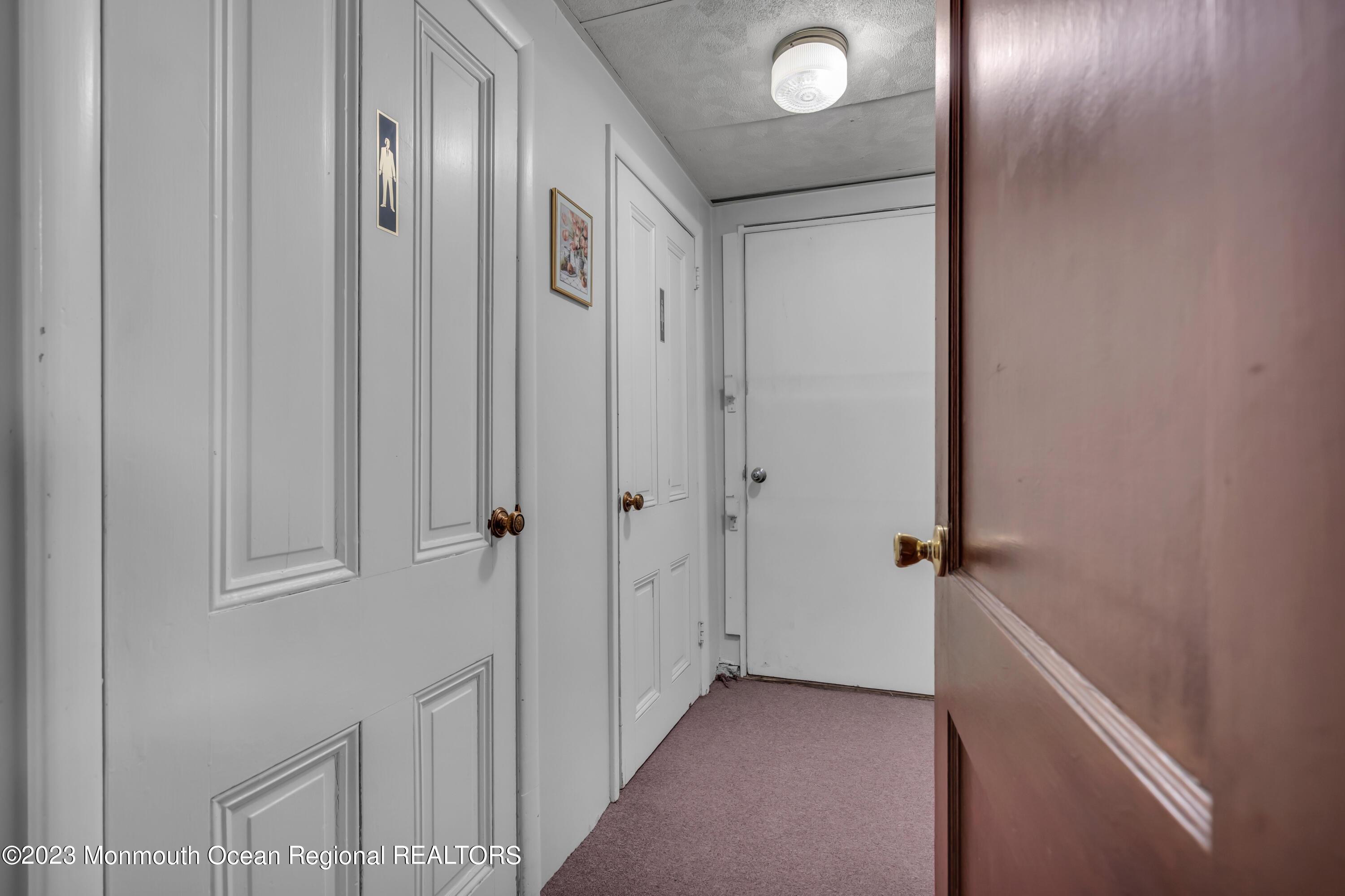 Hallway to restrooms & side exit