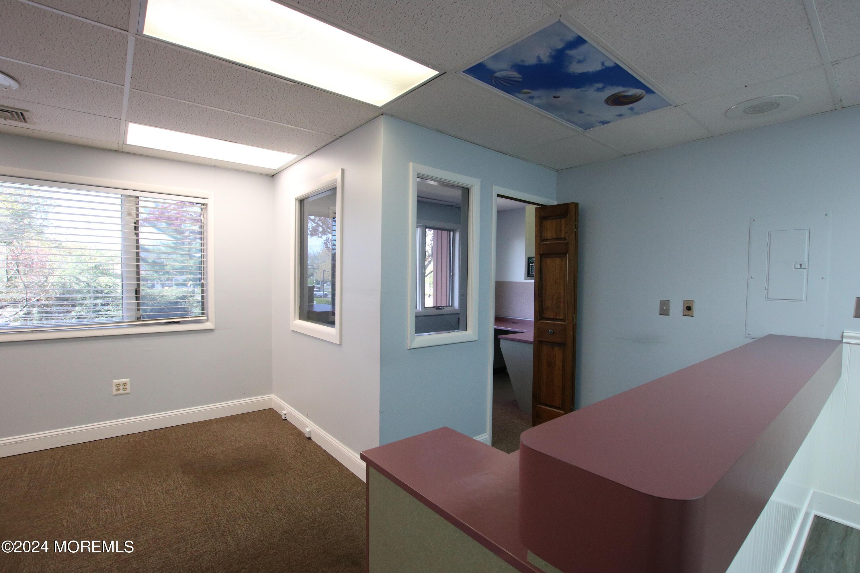 Reception area with easy access to waiting area and offices.