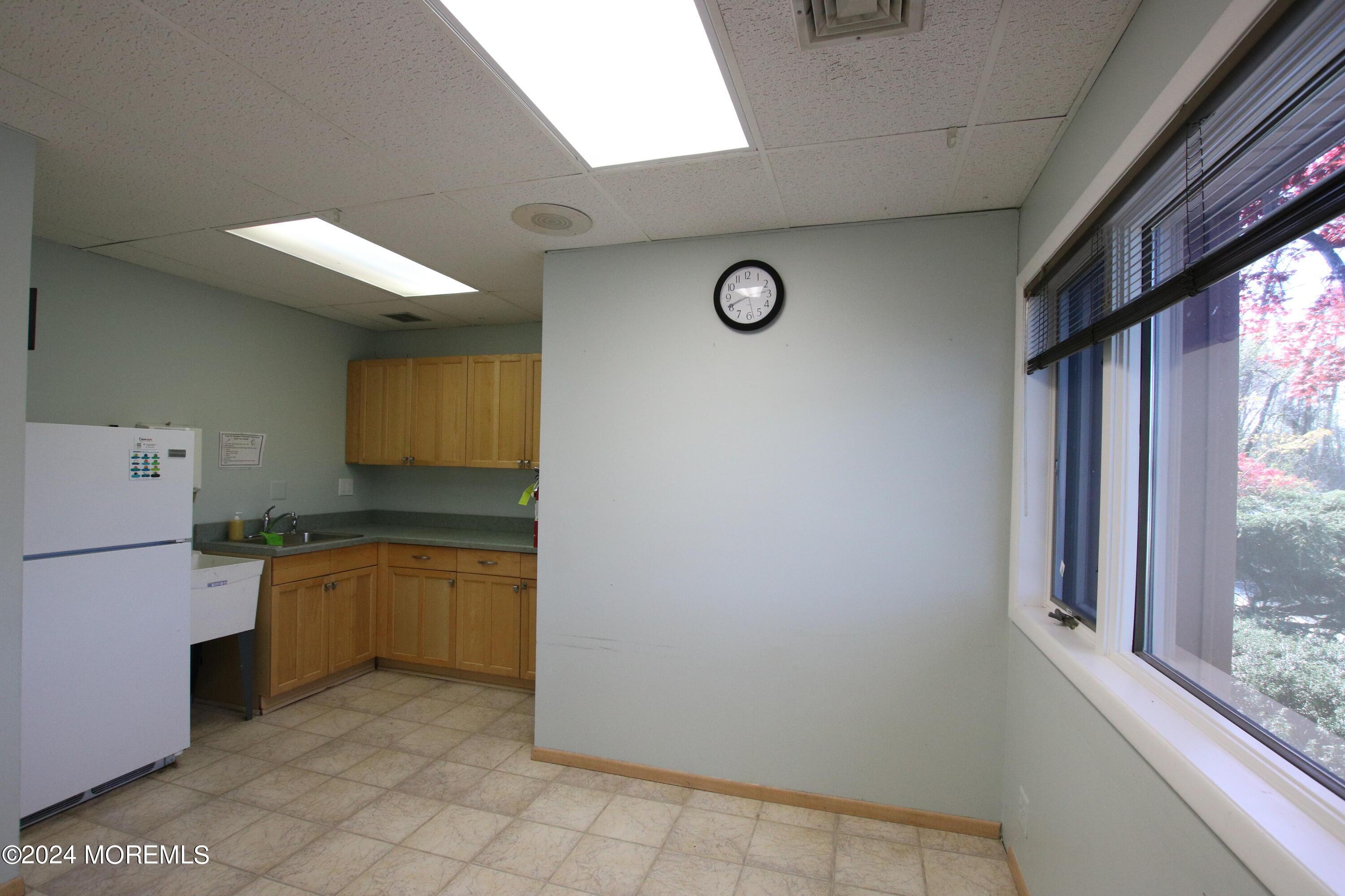 All purpose room that can be used for employees lunch/break room as well as meetings.