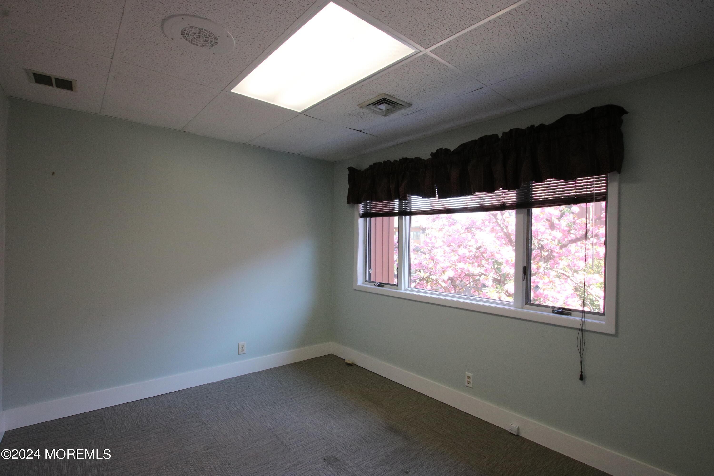 One of the five offices available in this suite.