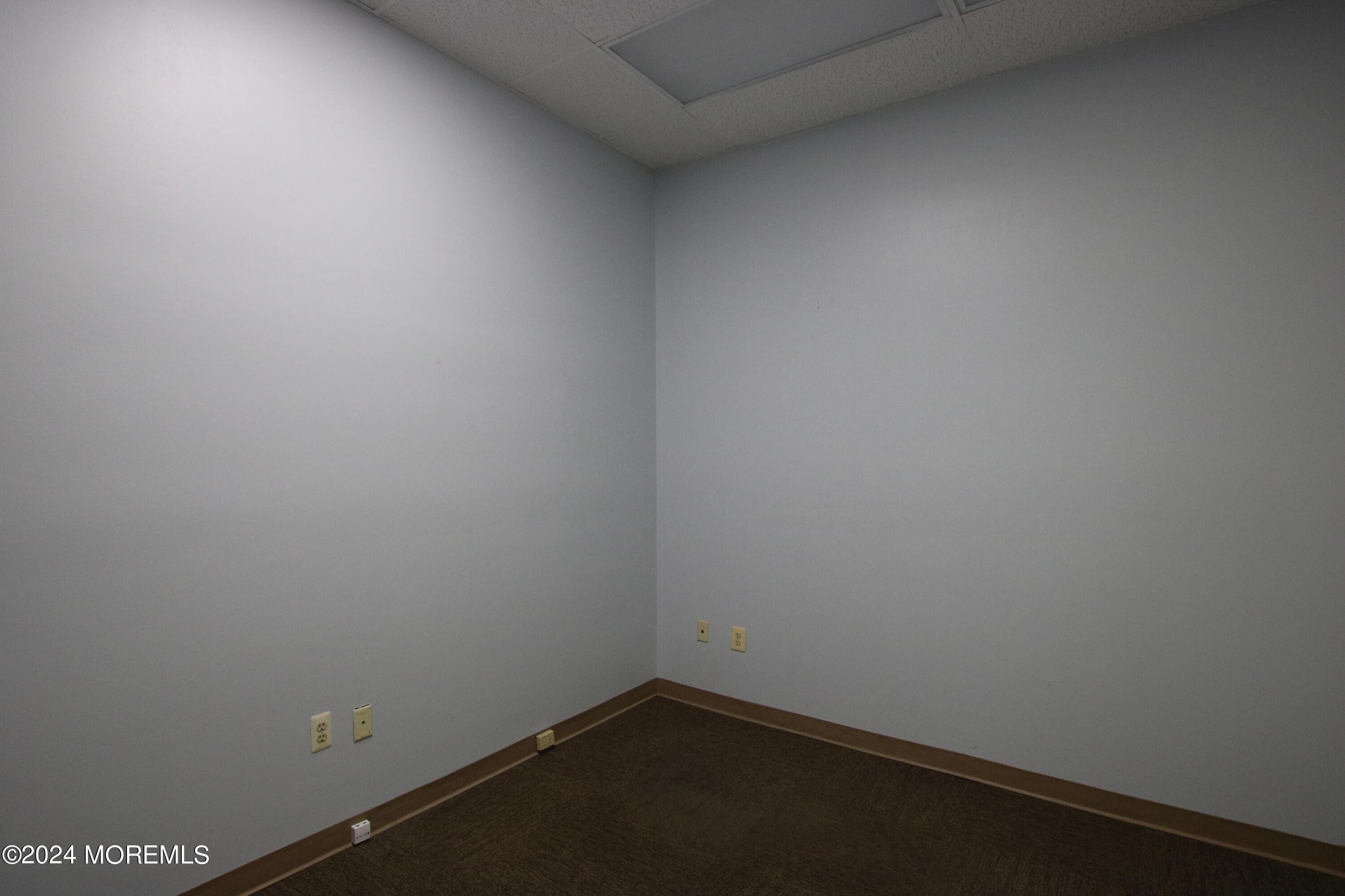 One of the five offices available in this suite.