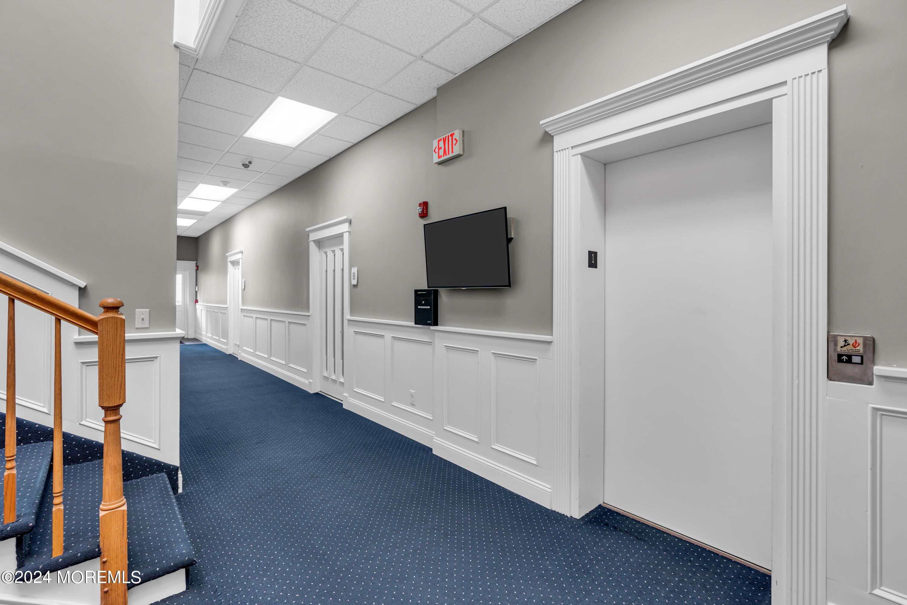 ELEVATOR IN THE BUILDING FOR UPSTAIRS TENANTS AND VISITORS.