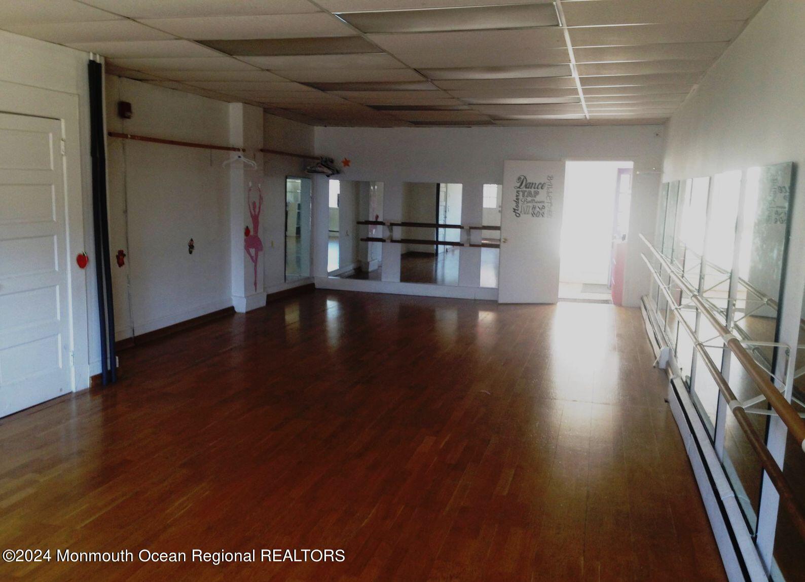 retail/office space on the first level, spanning approximately 1,000 square feet