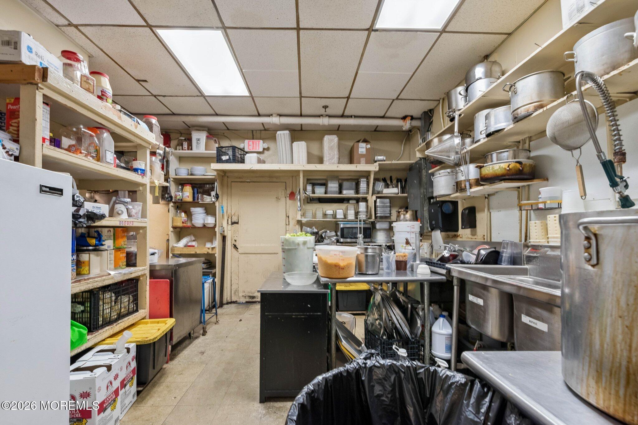 Food prep and storage areas pictured.
