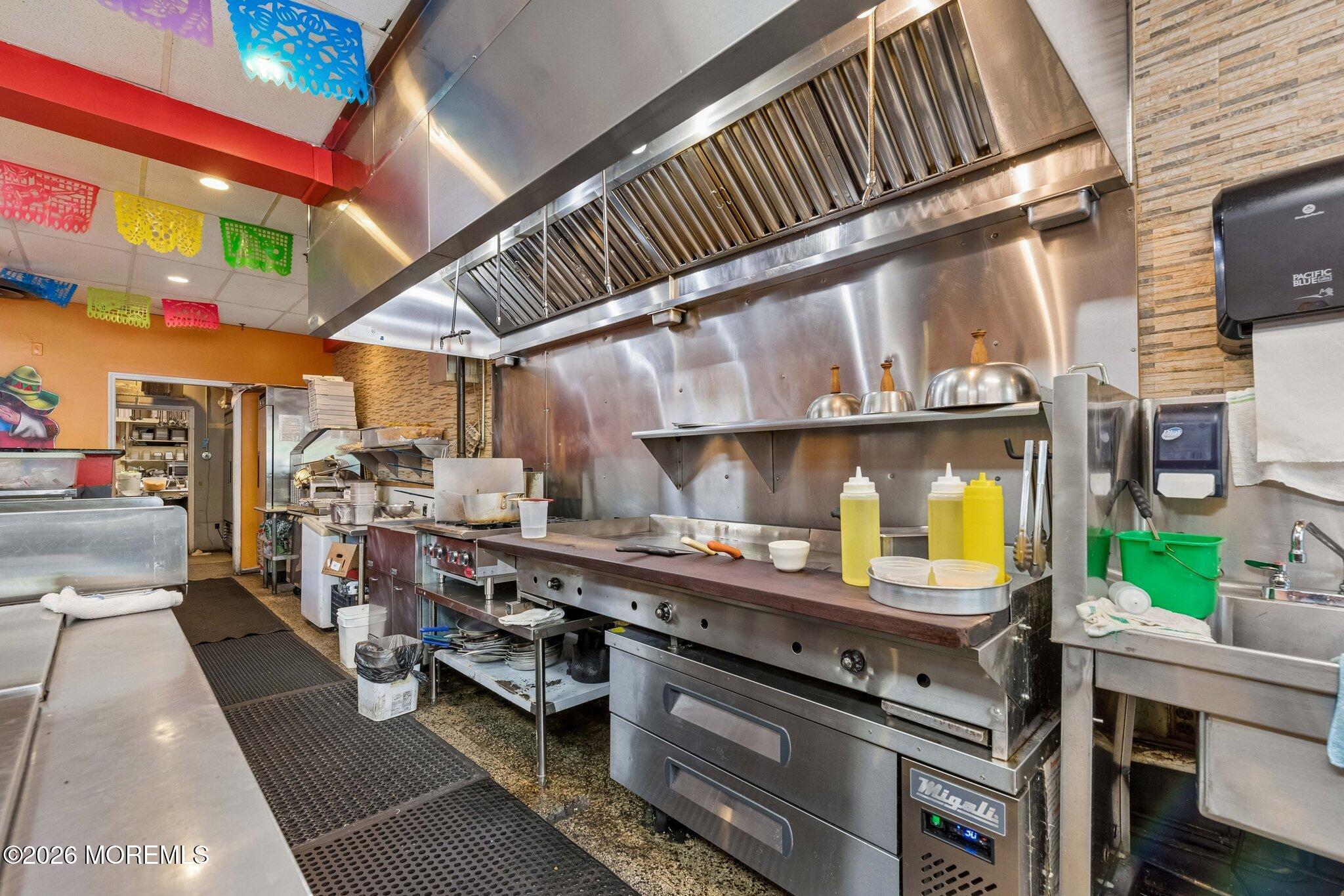 This is where the cooking magic starts! Flat top grill featured also.