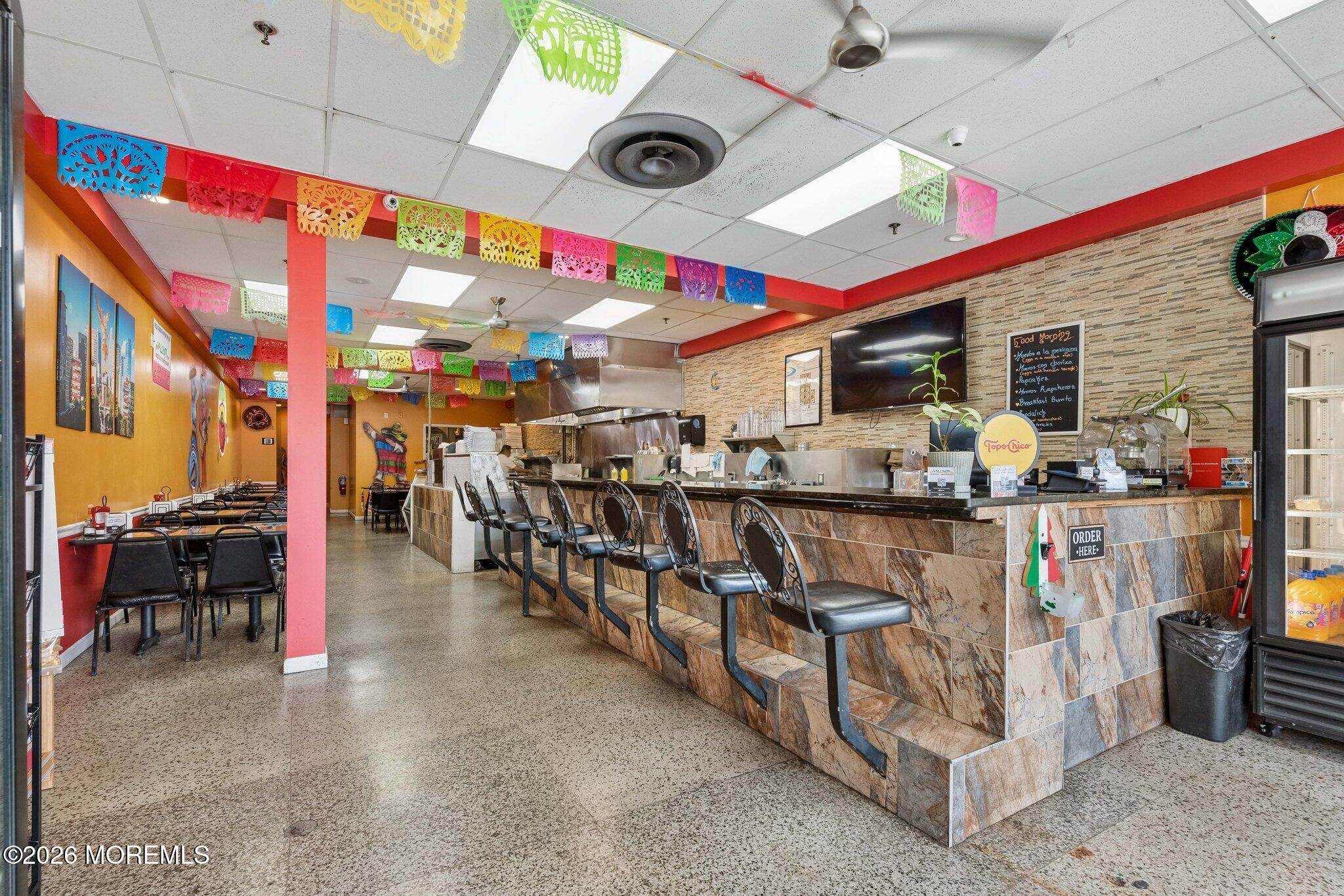 Restaurant seats over 50 people including counter seating.